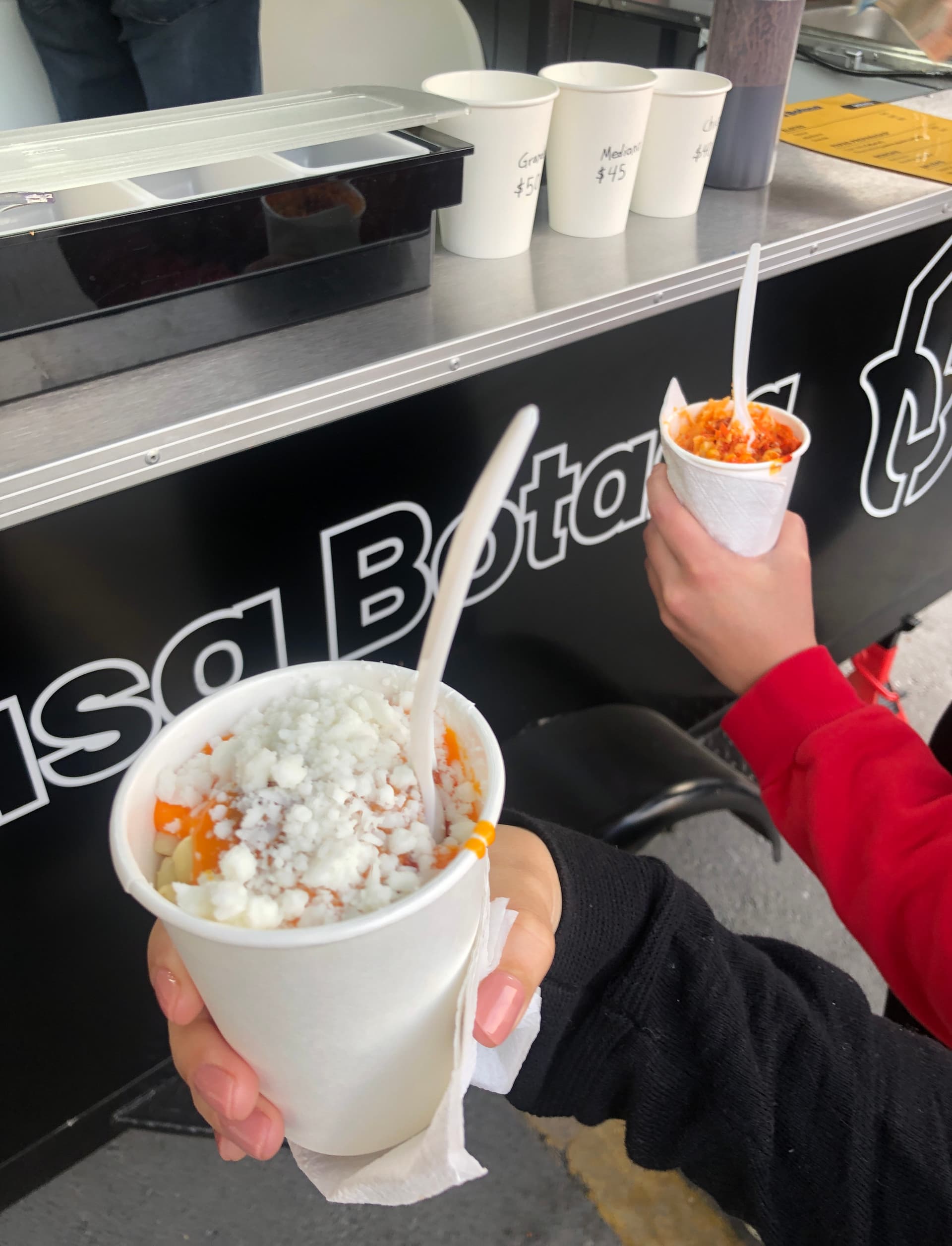 Foto de elote preparado en vaso.